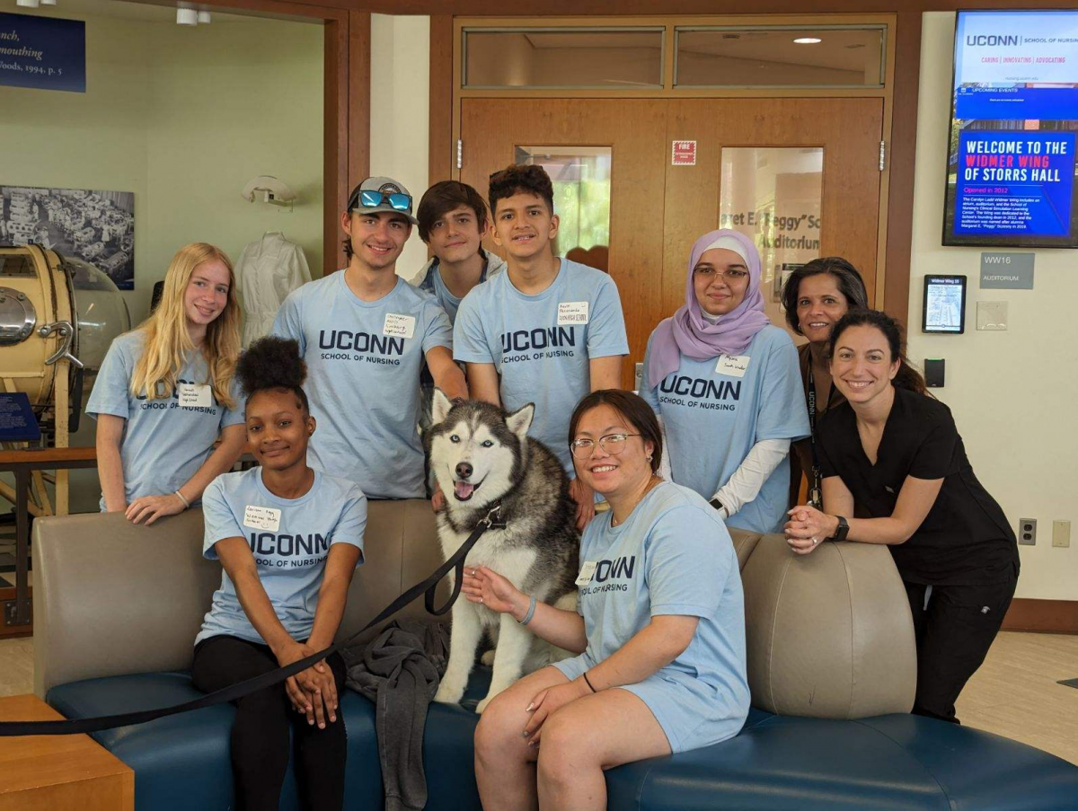 EINP Students with Jonathan the Husky Dog