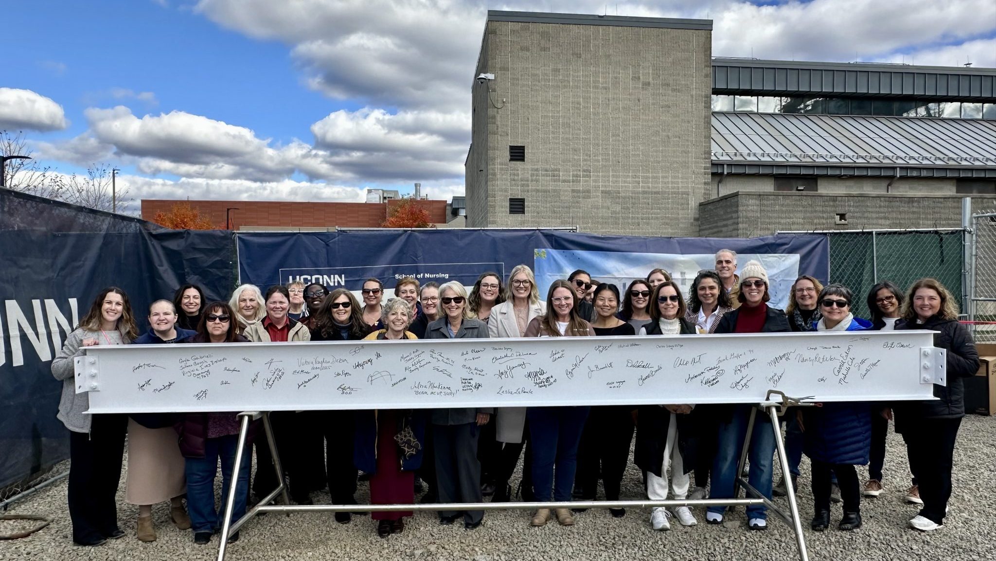 Elisabeth DeLuca School of Nursing faculty and staff at the beam signing ceremony on October 27, 2025. (Coral Aponte/UConn Photo)