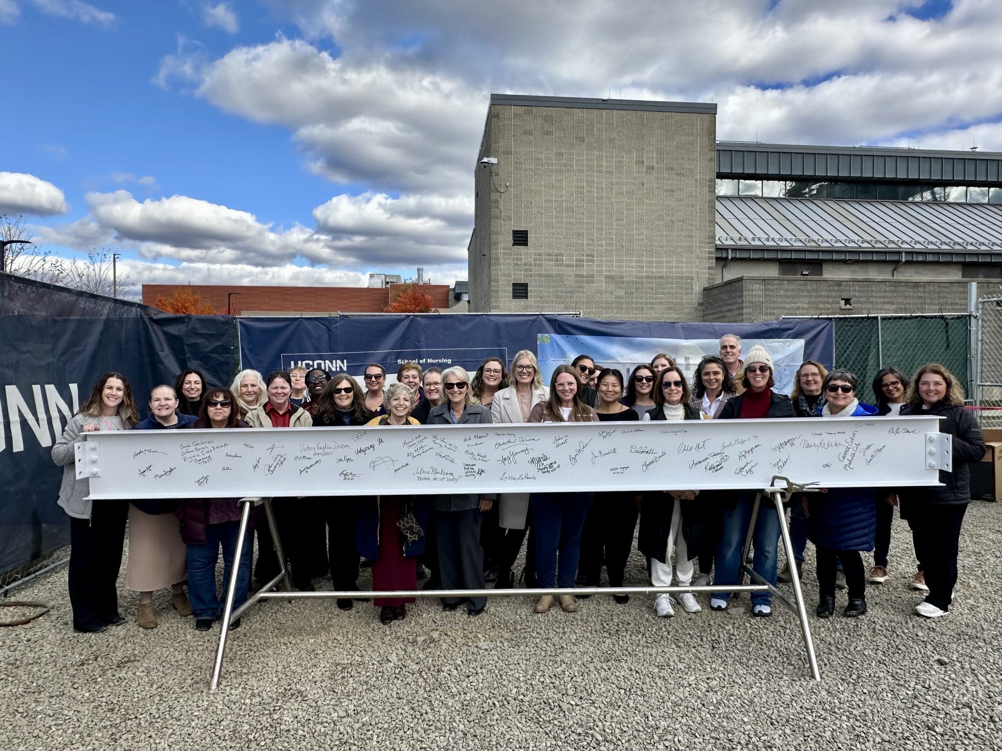 Elisabeth DeLuca School of Nursing faculty and staff at the beam signing ceremony on October 27, 2025. (Coral Aponte/UConn Photo)