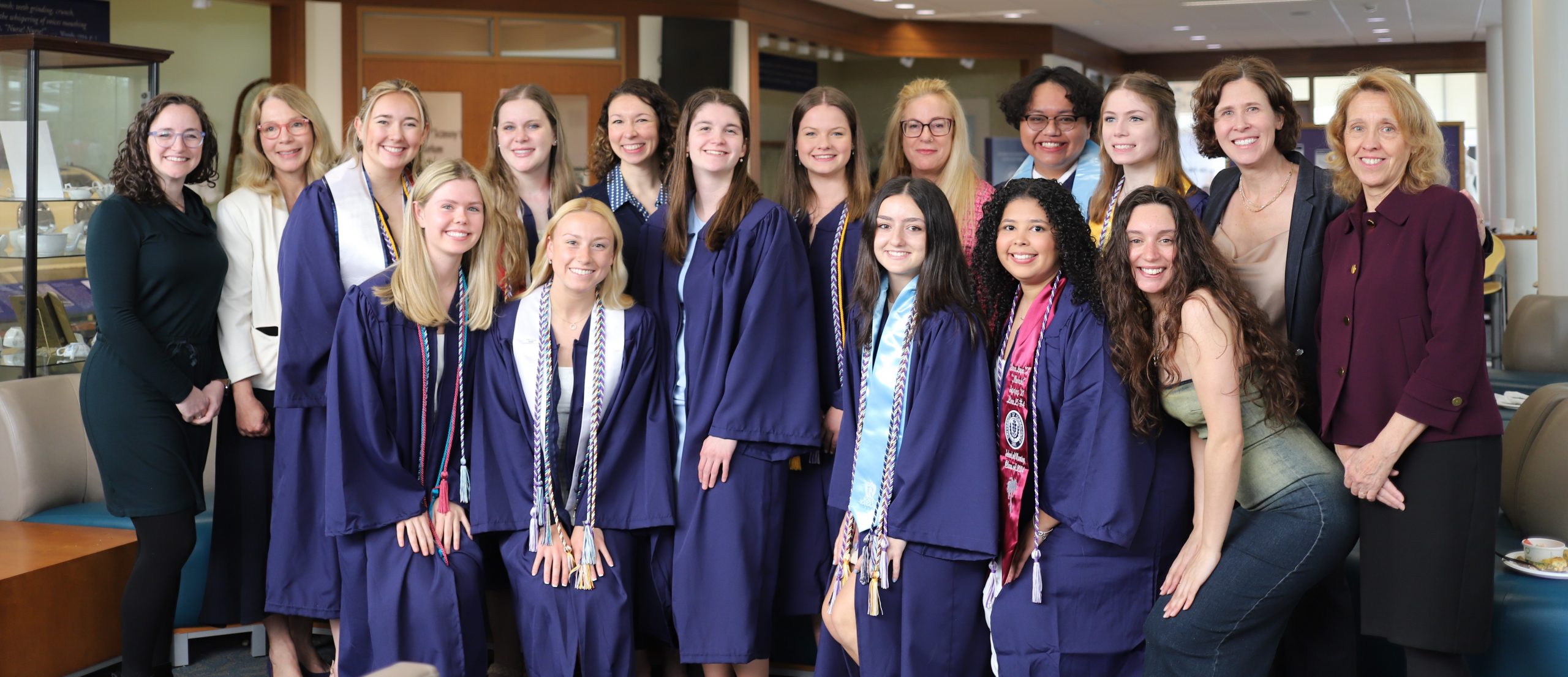 Class of 2022 Honors Program graduates pose with their faculty advisors